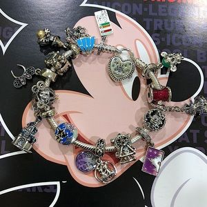 Disney Pandora Bracelet decorated w/Disney charms